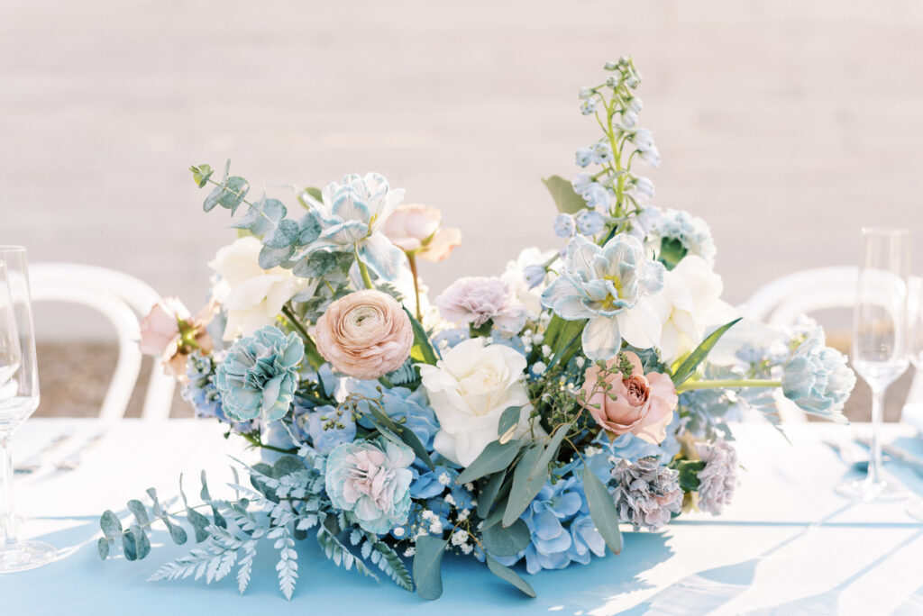 Blue wedding reception florals